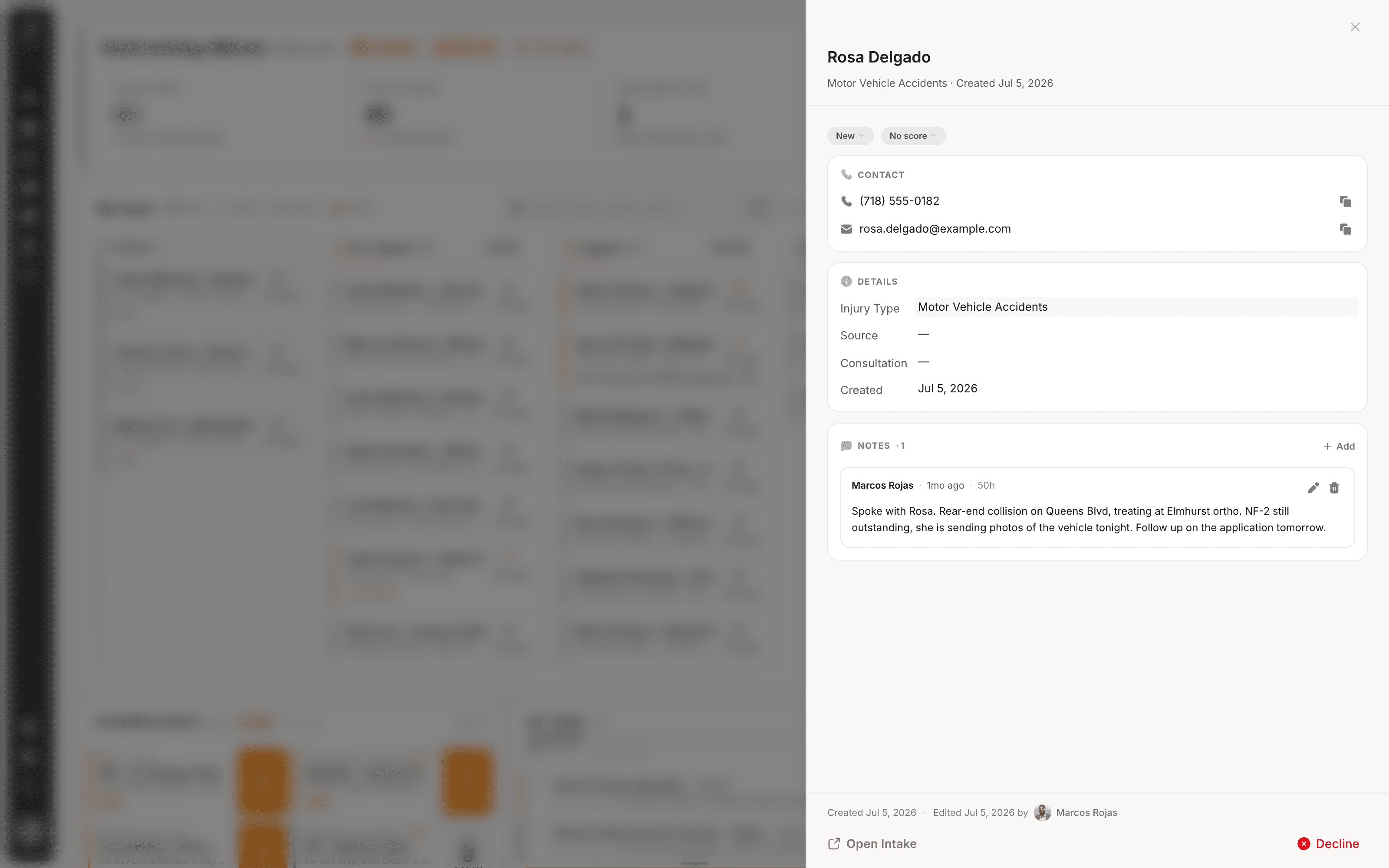 A new lead opened in a side panel over the JurisBuild dashboard: contact details, injury type, and intake notes